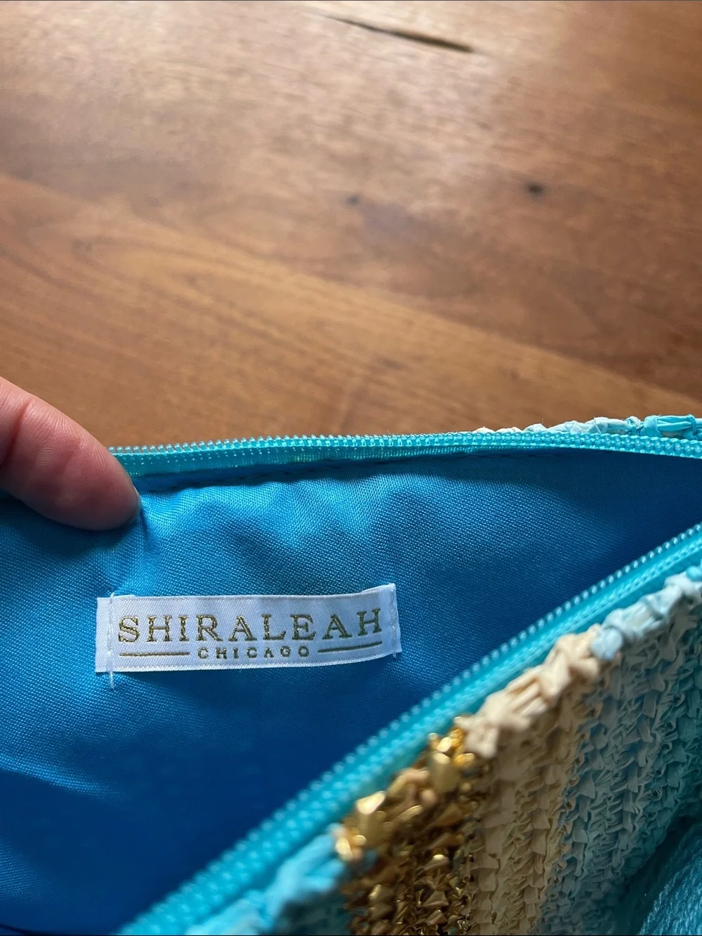 Shiraleah Chicago Striped Crochet straw Tassel Clutch - Aqua, Gold & Cream